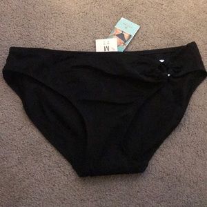 Black biki bottoms with metal hoop on left side